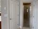Bathroom with shower stall and a door to another room at 1206 Persimmon Way, Mcdonough, GA 30252