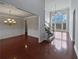 Two-story living room with hardwood floors and a staircase at 1206 Persimmon Way, Mcdonough, GA 30252