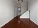 Spacious living room featuring hardwood floors and a grand staircase at 1206 Persimmon Way, Mcdonough, GA 30252