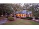 Two-story brick house with a large yard and trees at 992 Pj East Rd, Covington, GA 30014