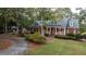 Two-story brick home with a spacious yard and long driveway at 992 Pj East Rd, Covington, GA 30014