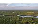 Aerial view of property showcasing expansive land and lake access at 992 Pj East Rd, Covington, GA 30014