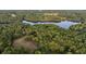Aerial view of property showcasing expansive land and lake access at 992 Pj East Rd, Covington, GA 30014