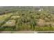 Aerial view of property with home, expansive land, and lake access at 992 Pj East Rd, Covington, GA 30014