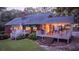 Home with deck, stairs, and patio at 992 Pj East Rd, Covington, GA 30014
