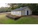 Detached barn with large doors and garden at 992 Pj East Rd, Covington, GA 30014
