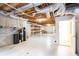 Unfinished basement with water filtration system and storage at 992 Pj East Rd, Covington, GA 30014