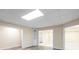 Finished basement with multiple rooms and built in shelving at 992 Pj East Rd, Covington, GA 30014