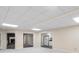 Open basement floor plan with kitchenette and multiple rooms at 992 Pj East Rd, Covington, GA 30014