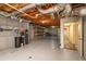 Unfinished basement with water filtration system and storage at 992 Pj East Rd, Covington, GA 30014