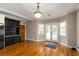 Bright dining area with hardwood floors and French doors leading to a deck at 992 Pj East Rd, Covington, GA 30014