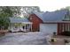Attached garage with ample parking space at 992 Pj East Rd, Covington, GA 30014