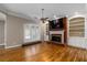 Spacious Gathering room with fireplace and built-in shelves at 992 Pj East Rd, Covington, GA 30014