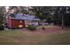 Brick home with expansive lawn and wooded backdrop at 992 Pj East Rd, Covington, GA 30014