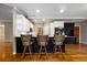 Kitchen island with seating and white cabinets at 992 Pj East Rd, Covington, GA 30014