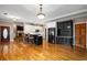 Spacious kitchen boasts an island, stainless steel appliances, and white cabinets at 992 Pj East Rd, Covington, GA 30014