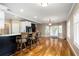Open kitchen features hardwood floors and access to a backyard patio at 992 Pj East Rd, Covington, GA 30014