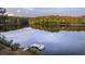 Scenic lakefront property with private dock; peaceful, wooded surroundings at 992 Pj East Rd, Covington, GA 30014