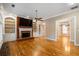 Large living room with hardwood floors and fireplace at 992 Pj East Rd, Covington, GA 30014