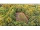 Spacious paddock with white post and rail fencing at 992 Pj East Rd, Covington, GA 30014