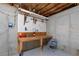 Basement workshop with pegboard and workbench at 992 Pj East Rd, Covington, GA 30014