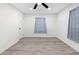 Spacious bedroom with hardwood floors and neutral walls at 3534 Spring Cir, Decatur, GA 30032