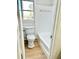 Clean bathroom with white tile and a bathtub at 553 W Sandtown Sw Rd, Marietta, GA 30064