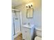 Bathroom with white vanity, shower and toilet at 553 W Sandtown Sw Rd, Marietta, GA 30064