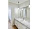 Updated bathroom with marble countertop and modern vanity at 553 W Sandtown Sw Rd, Marietta, GA 30064