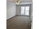 Bright bedroom with carpet flooring and ceiling fan at 553 W Sandtown Sw Rd, Marietta, GA 30064