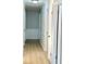 Light and bright hallway with wood-look flooring at 553 W Sandtown Sw Rd, Marietta, GA 30064