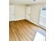 Living room with light flooring and large window at 553 W Sandtown Sw Rd, Marietta, GA 30064