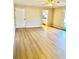 Bright living room featuring hardwood floors and view to kitchen at 553 W Sandtown Sw Rd, Marietta, GA 30064