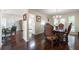 Bright dining room with dark hardwood floors and ornate furniture at 285 Glen Lake Dr, Sandy Springs, GA 30327