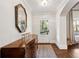 Bright entryway with hardwood floors and a stylish console table at 3790 Narmore Ne Dr, Atlanta, GA 30319