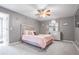 Charming bedroom with a pink bed and mirrored dresser at 405 Marvin Ct, Mcdonough, GA 30252