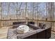 Spacious deck with patio furniture and fire pit at 405 Marvin Ct, Mcdonough, GA 30252