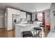 Modern kitchen with white cabinets and granite countertops at 405 Marvin Ct, Mcdonough, GA 30252