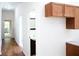 Bright hallway with wood floors and access to bathroom at 575 Rockwell Sw St, Atlanta, GA 30310