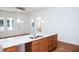 Modern kitchen with island and hardwood floors at 575 Rockwell Sw St, Atlanta, GA 30310