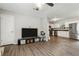 Open concept living room and kitchen with wood-look floors at 9012 Hurst Ct, Jonesboro, GA 30238