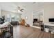 Home office features hardwood floors and built-in shelving at 9012 Hurst Ct, Jonesboro, GA 30238