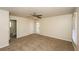 Neutral bedroom featuring ample natural light, neutral carpet, and a ceiling fan at 380 Oak Landing Cir, Douglasville, GA 30134