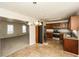 Open kitchen with stainless steel appliances seamlessly connected to a spacious living area at 380 Oak Landing Cir, Douglasville, GA 30134
