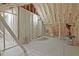 Unfinished attic space with foam insulation and exposed framing at 4320 Chapel Hill Farms Dr, Douglasville, GA 30135