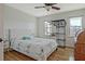 Bright bedroom with hardwood floors and a queen bed at 4320 Chapel Hill Farms Dr, Douglasville, GA 30135