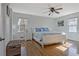 Bright bedroom with hardwood floors and ceiling fan at 4320 Chapel Hill Farms Dr, Douglasville, GA 30135