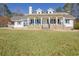 Ranch style home with wrap-around porch and stone accents at 4320 Chapel Hill Farms Dr, Douglasville, GA 30135
