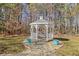 White gazebo with stone pathway, surrounded by trees at 4320 Chapel Hill Farms Dr, Douglasville, GA 30135