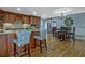 Eat-in kitchen with island, hardwood floors and ample cabinet space at 4320 Chapel Hill Farms Dr, Douglasville, GA 30135
